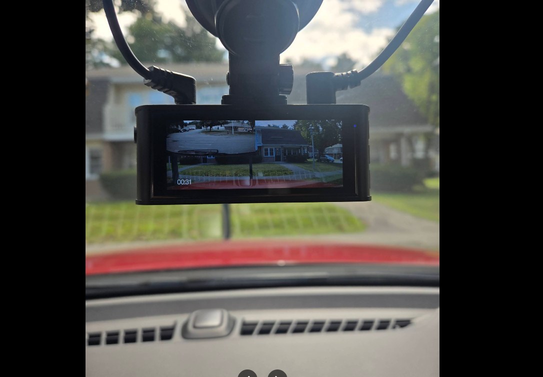 Mirror dash camera installed, showing live front and rear view